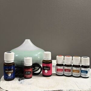 Young Living Essential oils with BONUS gently used diffuser! Tea tree, digize +